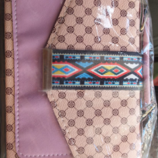 Cartera de mano y tira